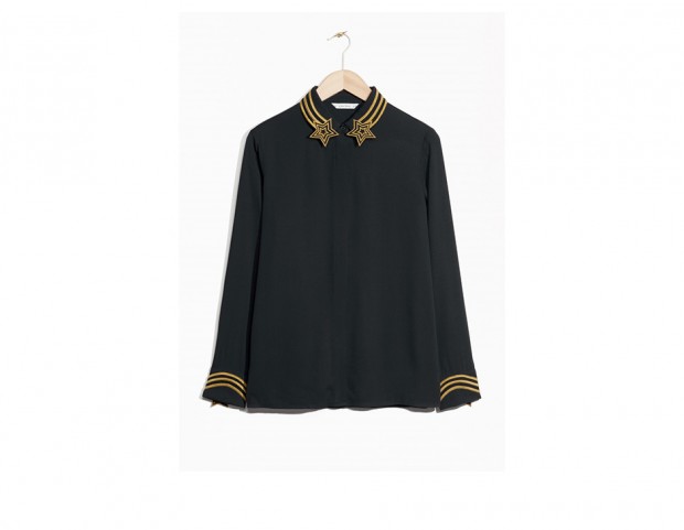 Blusa con stelle dorate